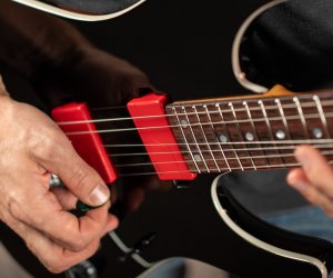 Guitarist performing with his guitar equipped with Fluence Modern Humbucker 6-String guitar pickups